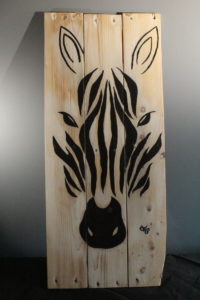 Zebra painted on wooden slats